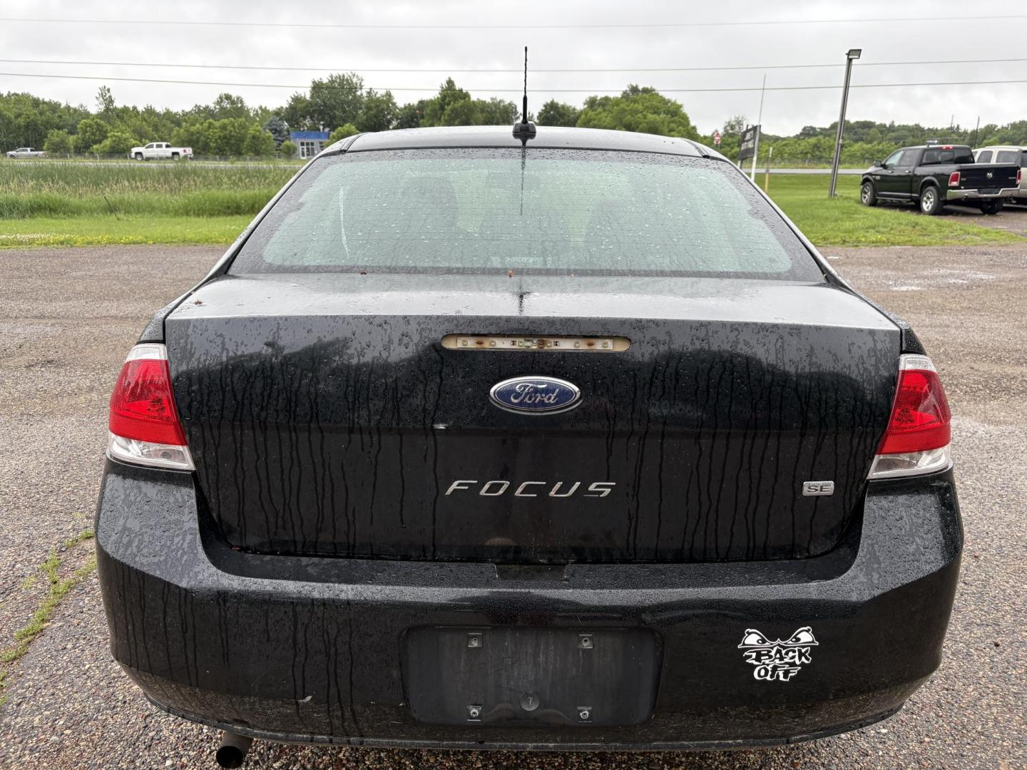 2010 Black Ford Focus SE Sedan (1FAHP3FN0AW) with an 2.0L L4 DOHC 16V engine, located at 17255 hwy 65 NE, Ham Lake, MN, 55304, 0.000000, 0.000000 - Photo#3
