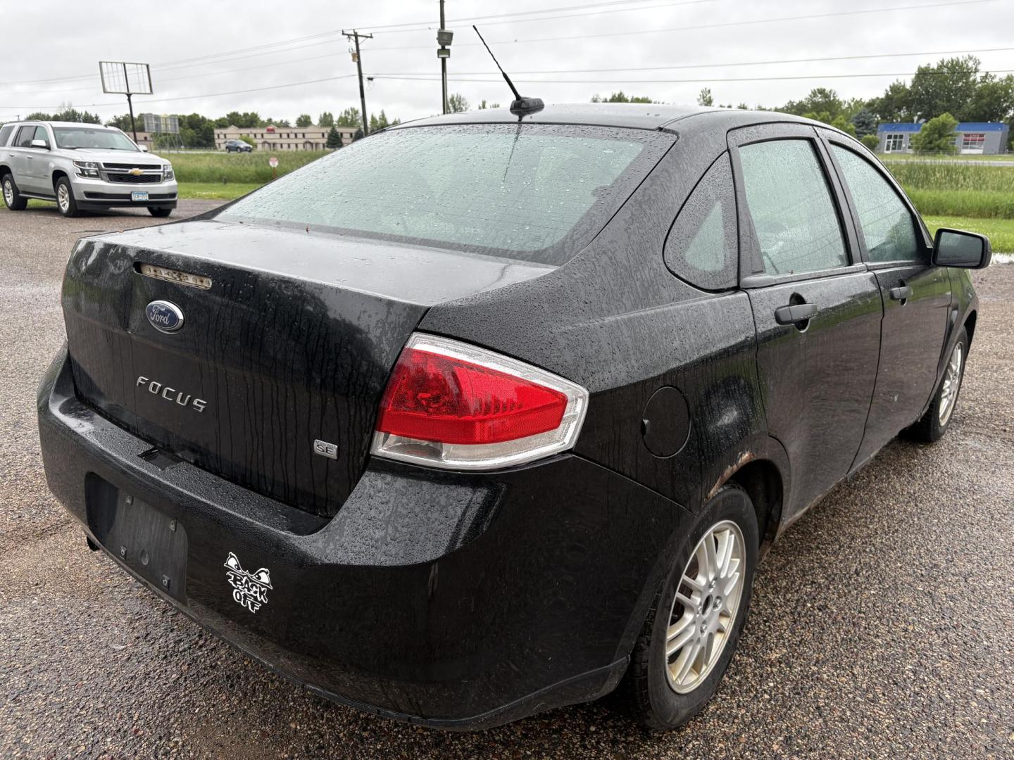 2010 Black Ford Focus SE Sedan (1FAHP3FN0AW) with an 2.0L L4 DOHC 16V engine, located at 17255 hwy 65 NE, Ham Lake, MN, 55304, 0.000000, 0.000000 - Photo#4