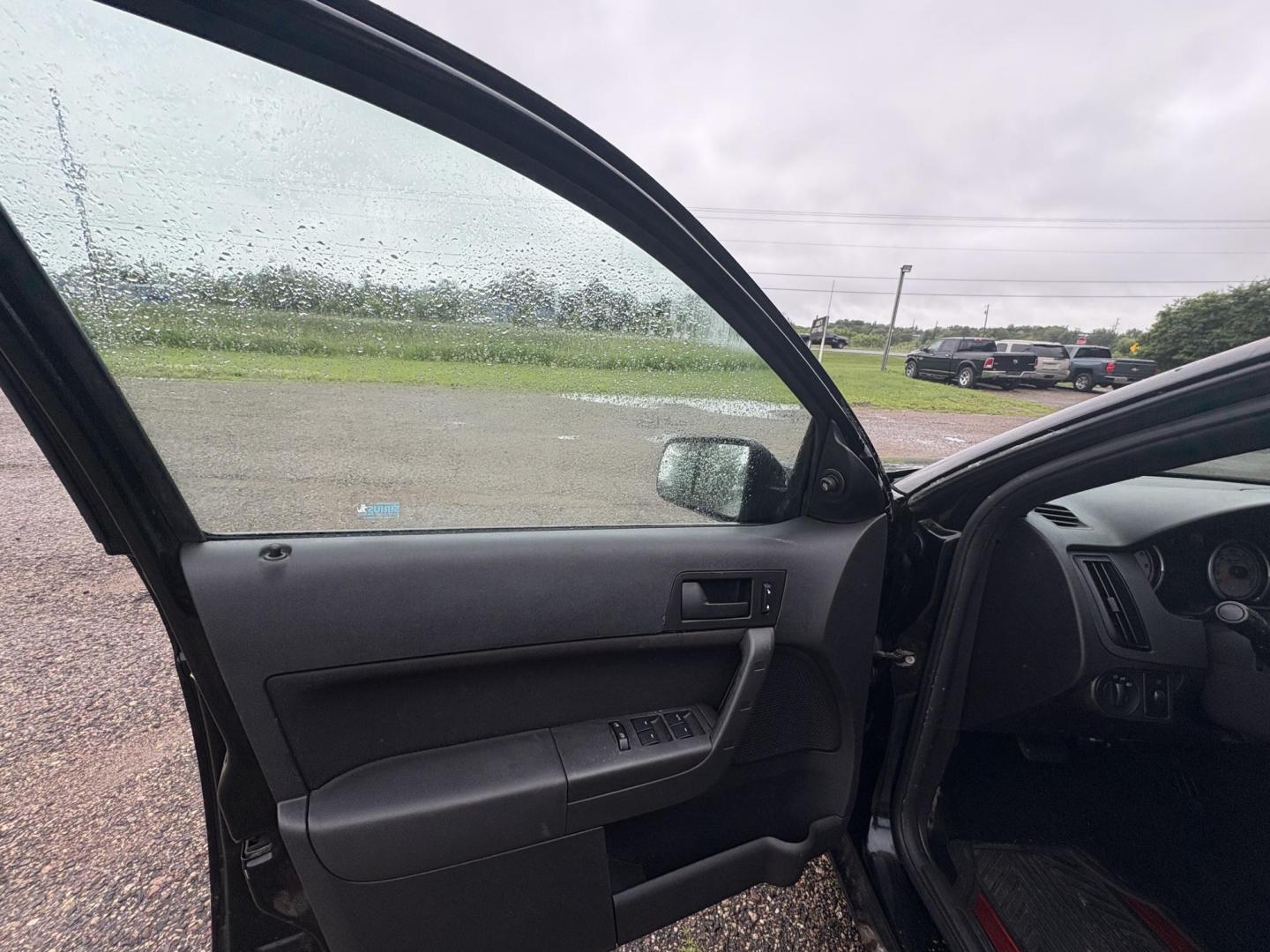 2010 Black Ford Focus SE Sedan (1FAHP3FN0AW) with an 2.0L L4 DOHC 16V engine, located at 17255 hwy 65 NE, Ham Lake, MN, 55304, 0.000000, 0.000000 - Photo#8
