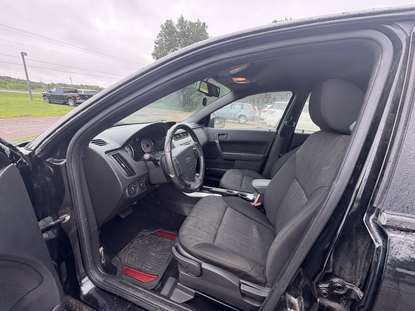 2010 Black Ford Focus SE Sedan (1FAHP3FN0AW) with an 2.0L L4 DOHC 16V engine, located at 17255 hwy 65 NE, Ham Lake, MN, 55304, 0.000000, 0.000000 - Photo#9
