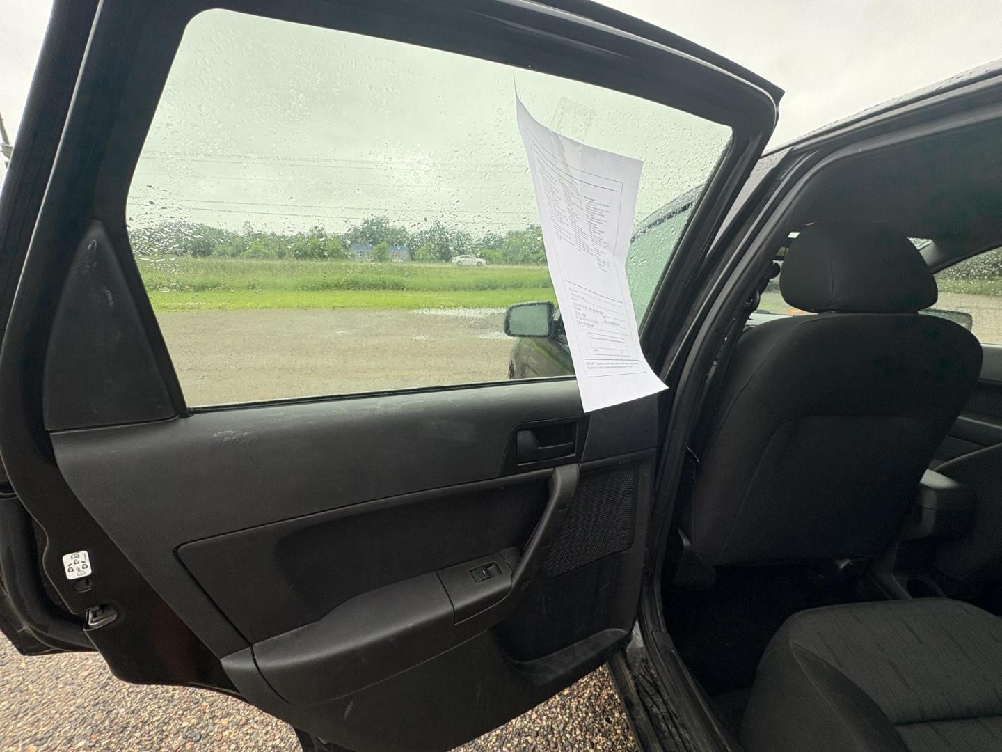 2010 Black Ford Focus SE Sedan (1FAHP3FN0AW) with an 2.0L L4 DOHC 16V engine, located at 17255 hwy 65 NE, Ham Lake, MN, 55304, 0.000000, 0.000000 - Photo#10