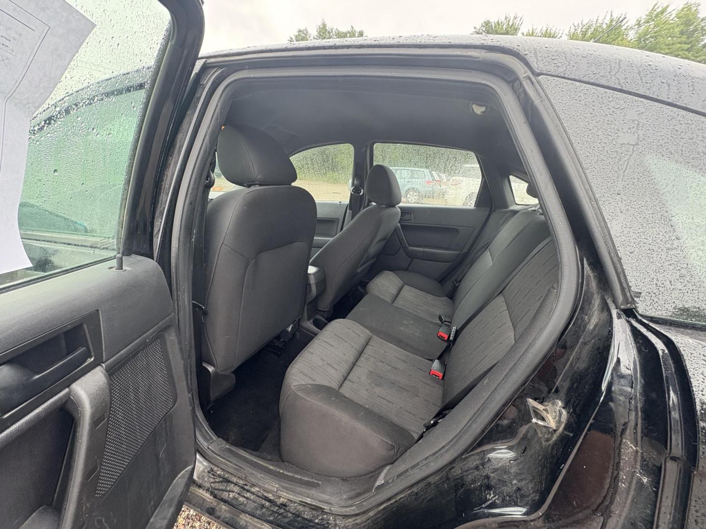 2010 Black Ford Focus SE Sedan (1FAHP3FN0AW) with an 2.0L L4 DOHC 16V engine, located at 17255 hwy 65 NE, Ham Lake, MN, 55304, 0.000000, 0.000000 - Photo#11