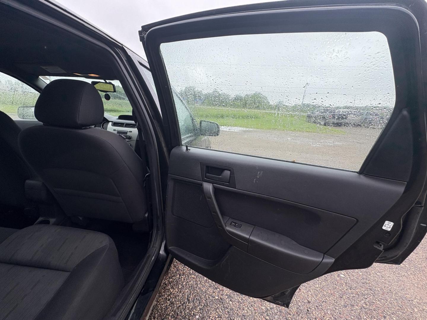 2010 Black Ford Focus SE Sedan (1FAHP3FN0AW) with an 2.0L L4 DOHC 16V engine, located at 17255 hwy 65 NE, Ham Lake, MN, 55304, 0.000000, 0.000000 - Photo#12