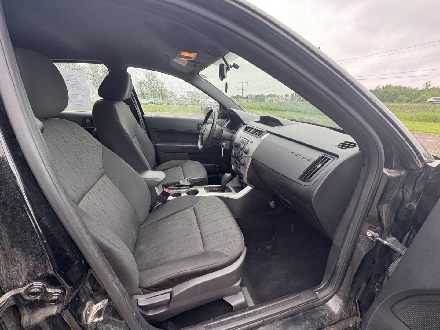 2010 Black Ford Focus SE Sedan (1FAHP3FN0AW) with an 2.0L L4 DOHC 16V engine, located at 17255 hwy 65 NE, Ham Lake, MN, 55304, 0.000000, 0.000000 - Photo#15