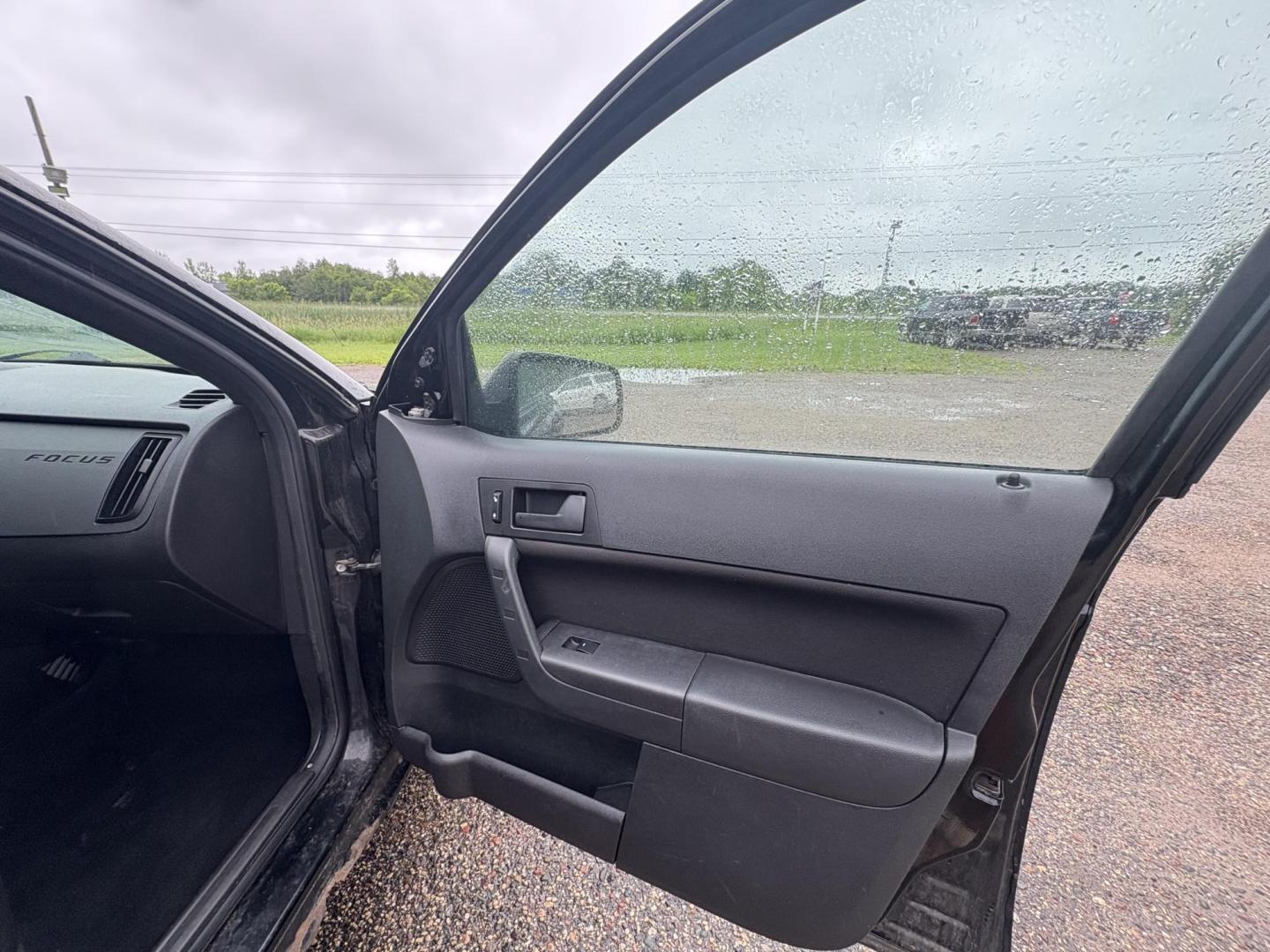 2010 Black Ford Focus SE Sedan (1FAHP3FN0AW) with an 2.0L L4 DOHC 16V engine, located at 17255 hwy 65 NE, Ham Lake, MN, 55304, 0.000000, 0.000000 - Photo#14