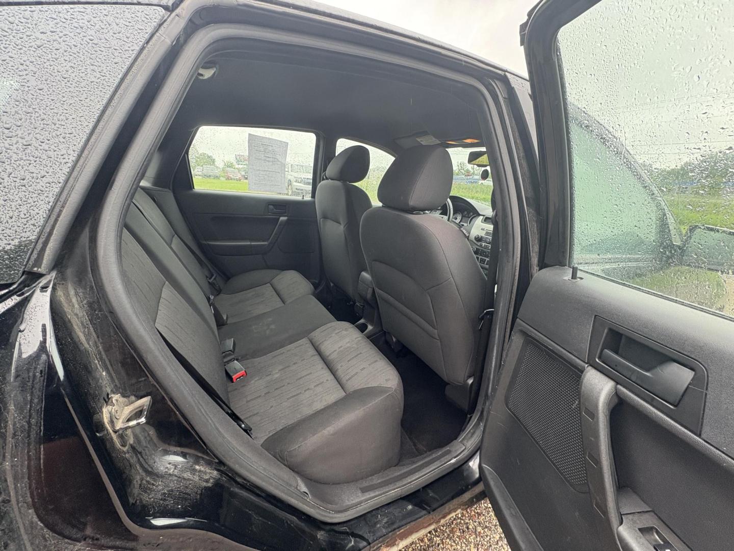 2010 Black Ford Focus SE Sedan (1FAHP3FN0AW) with an 2.0L L4 DOHC 16V engine, located at 17255 hwy 65 NE, Ham Lake, MN, 55304, 0.000000, 0.000000 - Photo#13