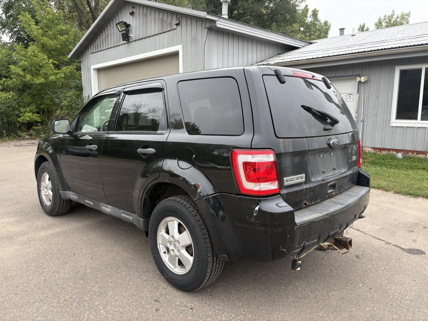 2011 Black Ford Escape XLS 4WD AT (1FMCU9C77BK) with an 2.5L L4 DOHC 16V engine, 6-Speed Automatic transmission, located at 17255 hwy 65 NE, Ham Lake, MN, 55304, 0.000000, 0.000000- Photo#2