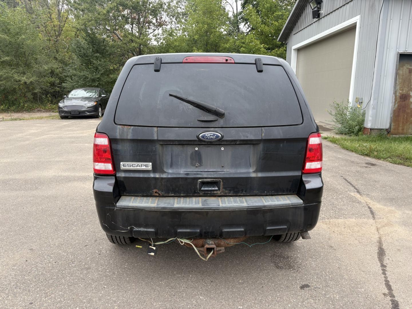 2011 Black Ford Escape XLS 4WD AT (1FMCU9C77BK) with an 2.5L L4 DOHC 16V engine, 6-Speed Automatic transmission, located at 17255 hwy 65 NE, Ham Lake, MN, 55304, 0.000000, 0.000000- Photo#3