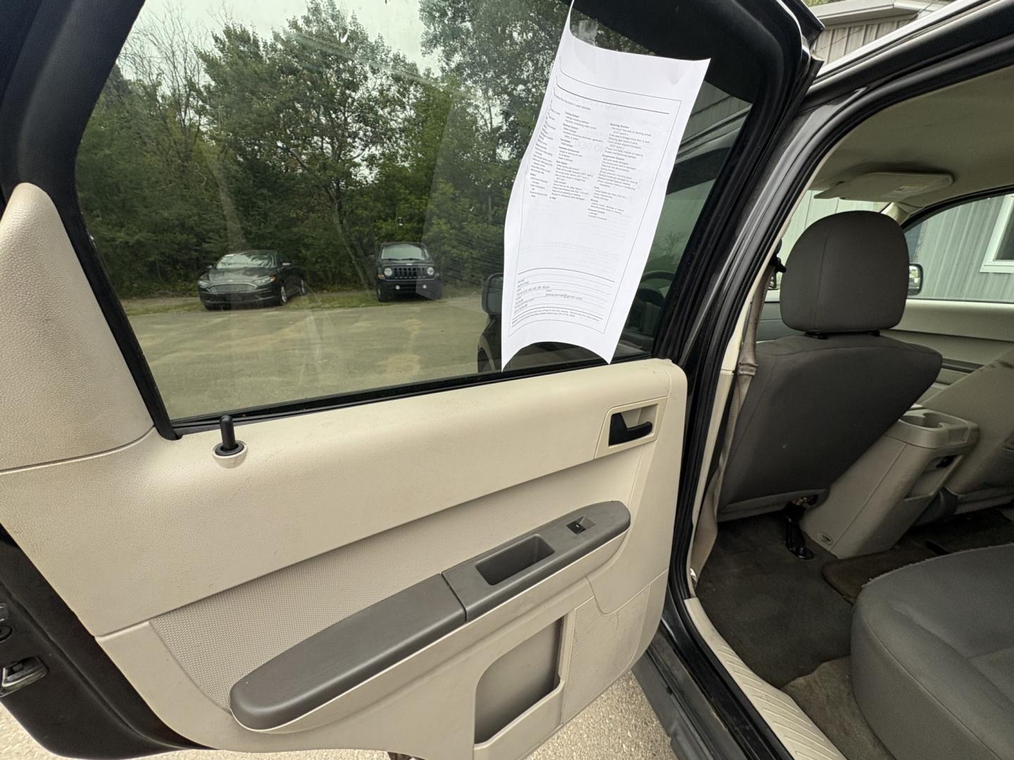 2011 Black Ford Escape XLS 4WD AT (1FMCU9C77BK) with an 2.5L L4 DOHC 16V engine, 6-Speed Automatic transmission, located at 17255 hwy 65 NE, Ham Lake, MN, 55304, 0.000000, 0.000000- Photo#10