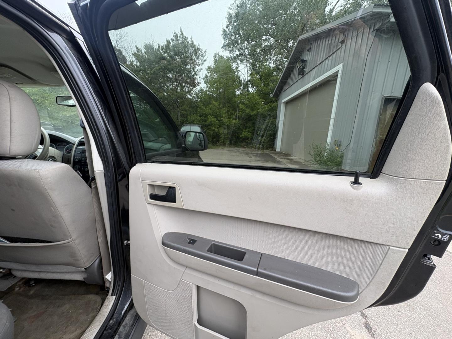2011 Black Ford Escape XLS 4WD AT (1FMCU9C77BK) with an 2.5L L4 DOHC 16V engine, 6-Speed Automatic transmission, located at 17255 hwy 65 NE, Ham Lake, MN, 55304, 0.000000, 0.000000- Photo#12