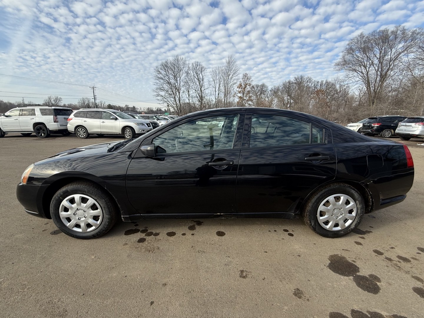 2006 Black Mitsubishi Galant DE (4A3AB26FX6E) with an 2.4L L4 SOHC 16V engine, 4-Speed Automatic Overdrive transmission, located at 17255 hwy 65 NE, Ham Lake, MN, 55304, 0.000000, 0.000000 - Photo#1