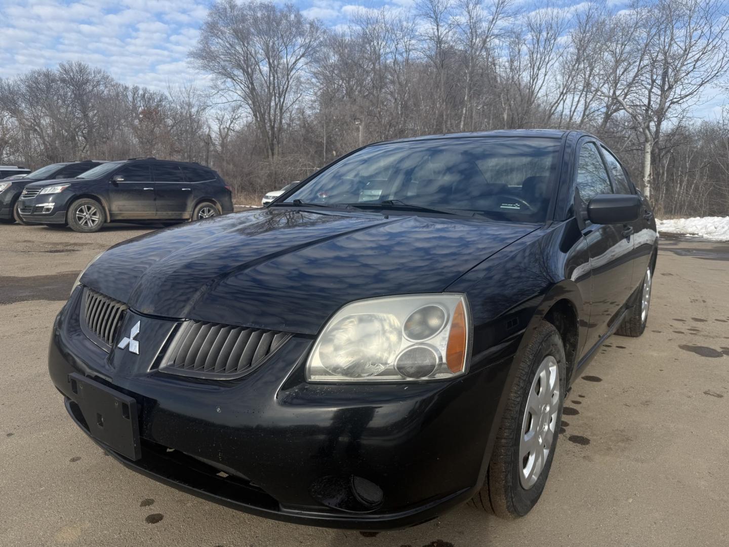 2006 Black Mitsubishi Galant DE (4A3AB26FX6E) with an 2.4L L4 SOHC 16V engine, 4-Speed Automatic Overdrive transmission, located at 17255 hwy 65 NE, Ham Lake, MN, 55304, 0.000000, 0.000000 - Photo#0