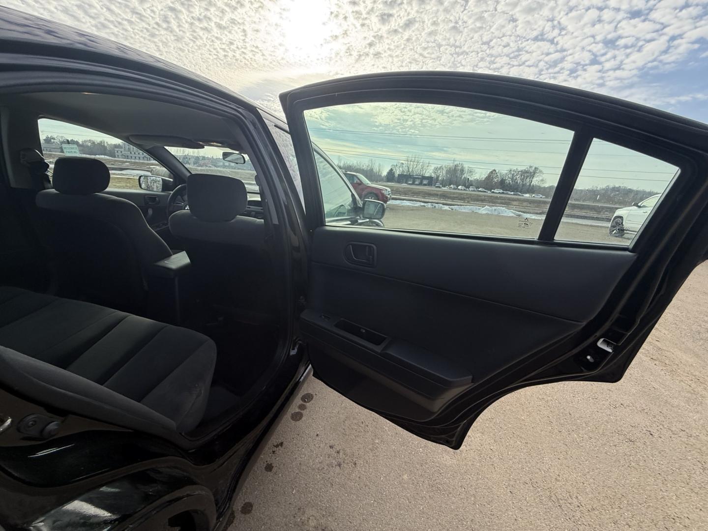 2006 Black Mitsubishi Galant DE (4A3AB26FX6E) with an 2.4L L4 SOHC 16V engine, 4-Speed Automatic Overdrive transmission, located at 17255 hwy 65 NE, Ham Lake, MN, 55304, 0.000000, 0.000000 - Photo#12