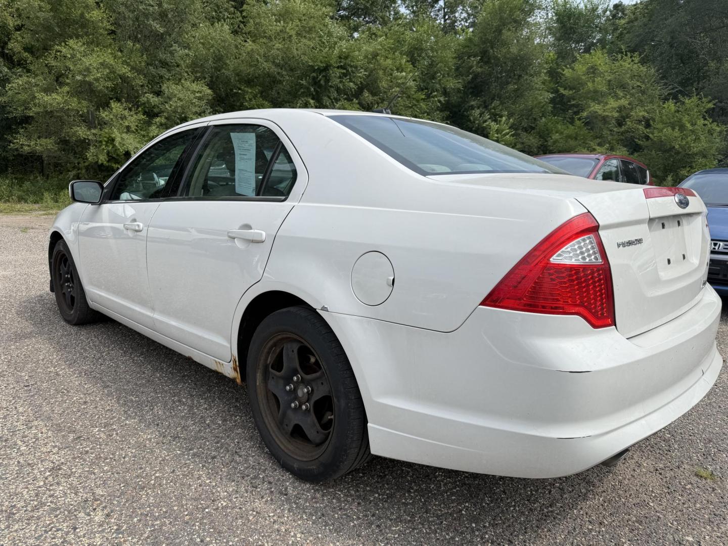 2010 White Ford Fusion SE (3FAHP0HG3AR) with an 3.0L V6 DOHC 24V engine, located at 17255 hwy 65 NE, Ham Lake, MN, 55304, 0.000000, 0.000000 - Photo#2