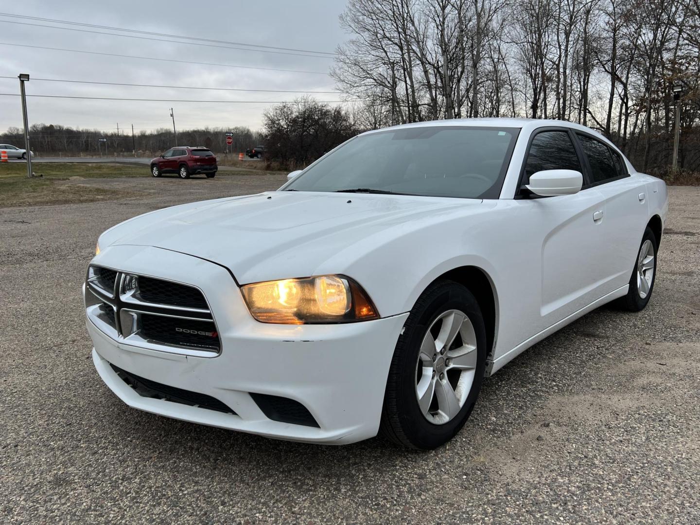 2014 White Dodge Charger SE (2C3CDXBG8EH) with an 3.6L V6 DOHC 24V engine, 5-Speed Automatic transmission, located at 17255 hwy 65 NE, Ham Lake, MN, 55304, 0.000000, 0.000000 - Photo#0