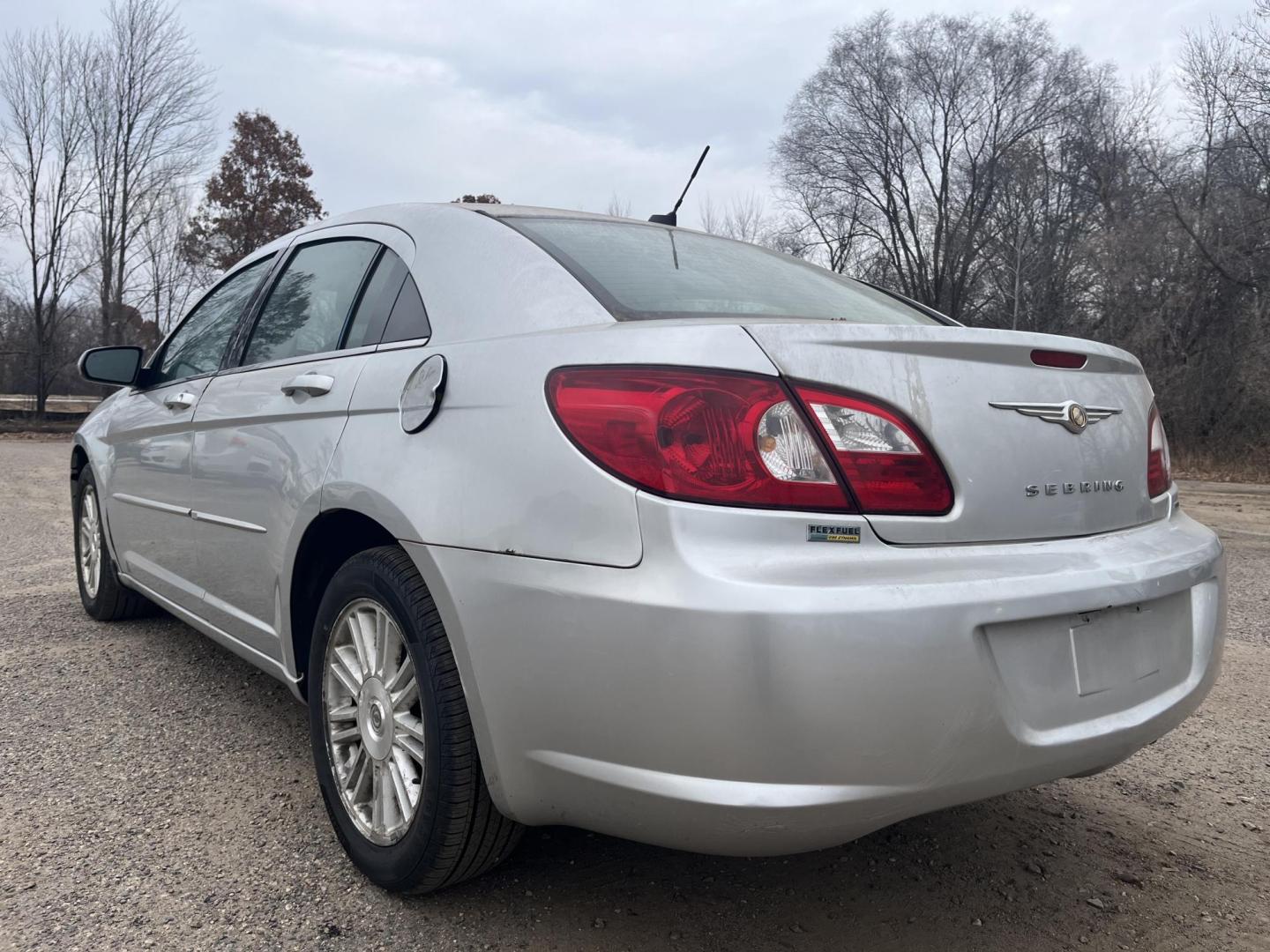 2007 silver Chrysler Sebring Touring (1C3LC56R57N) with an 2.7L V6 DOHC 24V FFV engine, 4-Speed Automatic Overdrive transmission, located at 17255 hwy 65 NE, Ham Lake, MN, 55304, 0.000000, 0.000000 - Photo#2