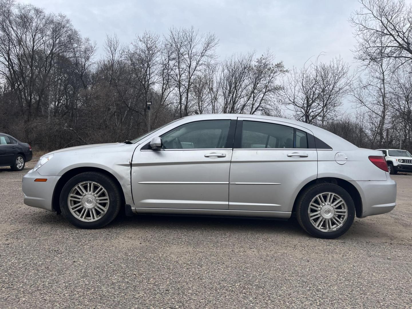 2007 silver Chrysler Sebring Touring (1C3LC56R57N) with an 2.7L V6 DOHC 24V FFV engine, 4-Speed Automatic Overdrive transmission, located at 17255 hwy 65 NE, Ham Lake, MN, 55304, 0.000000, 0.000000 - Photo#1