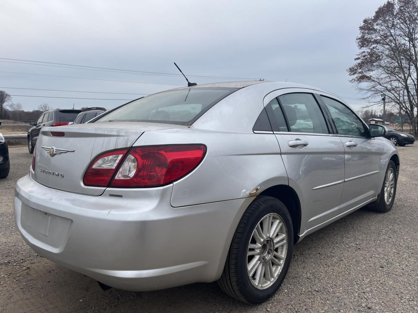 2007 silver Chrysler Sebring Touring (1C3LC56R57N) with an 2.7L V6 DOHC 24V FFV engine, 4-Speed Automatic Overdrive transmission, located at 17255 hwy 65 NE, Ham Lake, MN, 55304, 0.000000, 0.000000 - Photo#4