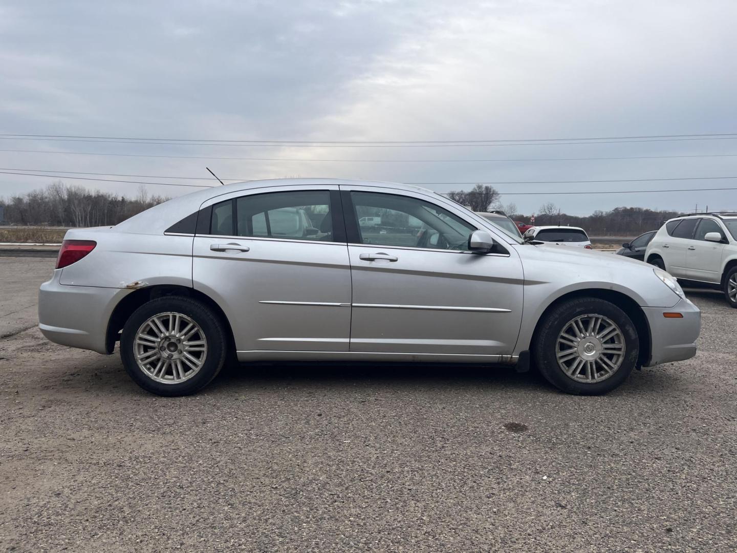 2007 silver Chrysler Sebring Touring (1C3LC56R57N) with an 2.7L V6 DOHC 24V FFV engine, 4-Speed Automatic Overdrive transmission, located at 17255 hwy 65 NE, Ham Lake, MN, 55304, 0.000000, 0.000000 - Photo#5