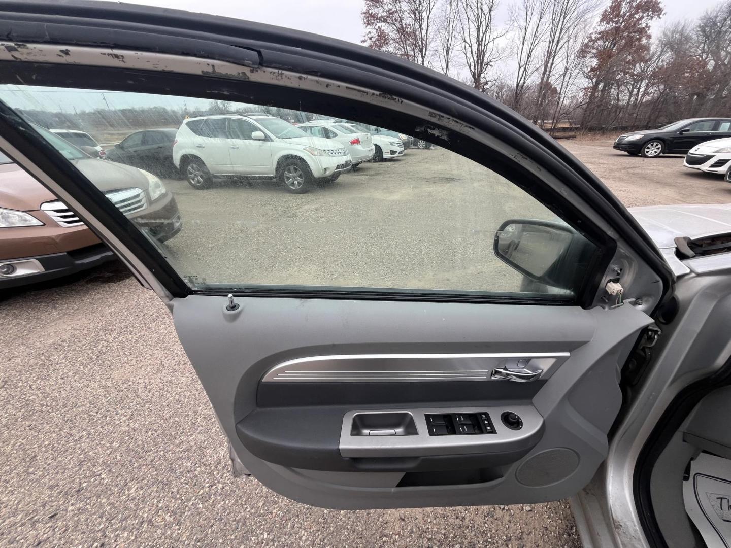 2007 silver Chrysler Sebring Touring (1C3LC56R57N) with an 2.7L V6 DOHC 24V FFV engine, 4-Speed Automatic Overdrive transmission, located at 17255 hwy 65 NE, Ham Lake, MN, 55304, 0.000000, 0.000000 - Photo#8