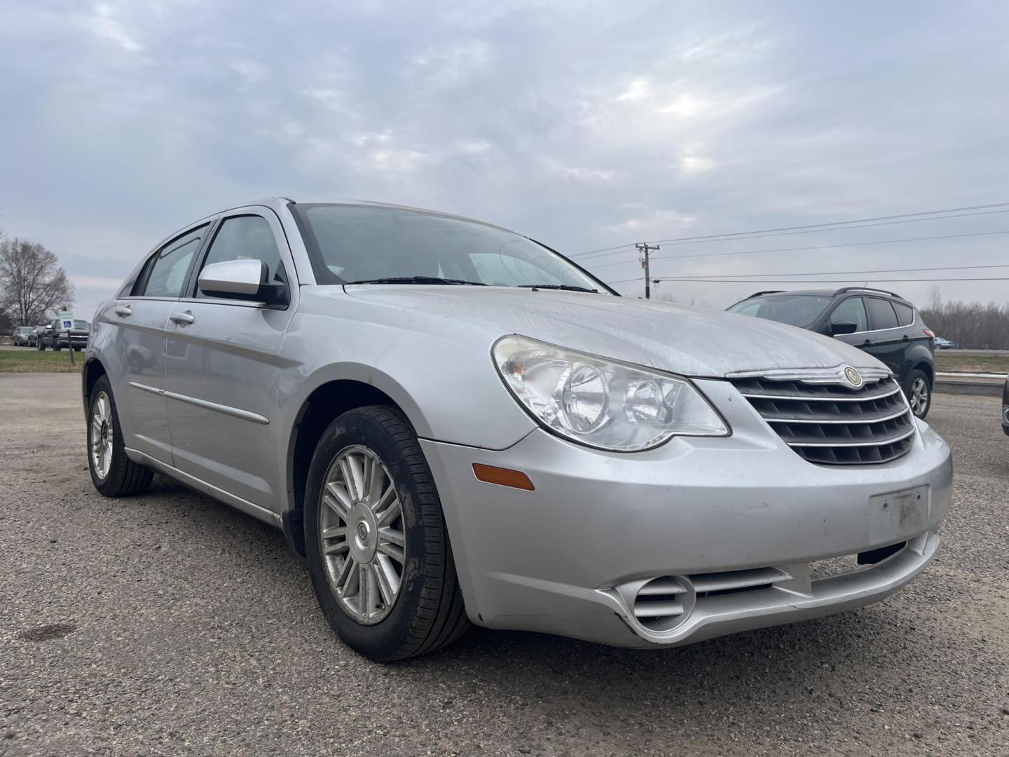 2007 silver Chrysler Sebring Touring (1C3LC56R57N) with an 2.7L V6 DOHC 24V FFV engine, 4-Speed Automatic Overdrive transmission, located at 17255 hwy 65 NE, Ham Lake, MN, 55304, 0.000000, 0.000000 - Photo#6