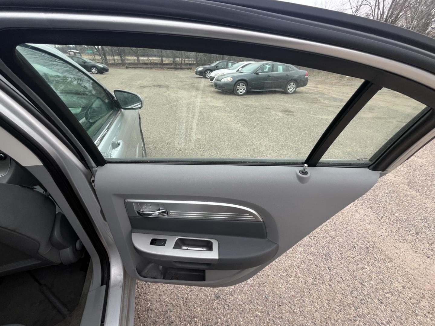 2007 silver Chrysler Sebring Touring (1C3LC56R57N) with an 2.7L V6 DOHC 24V FFV engine, 4-Speed Automatic Overdrive transmission, located at 17255 hwy 65 NE, Ham Lake, MN, 55304, 0.000000, 0.000000 - Photo#14