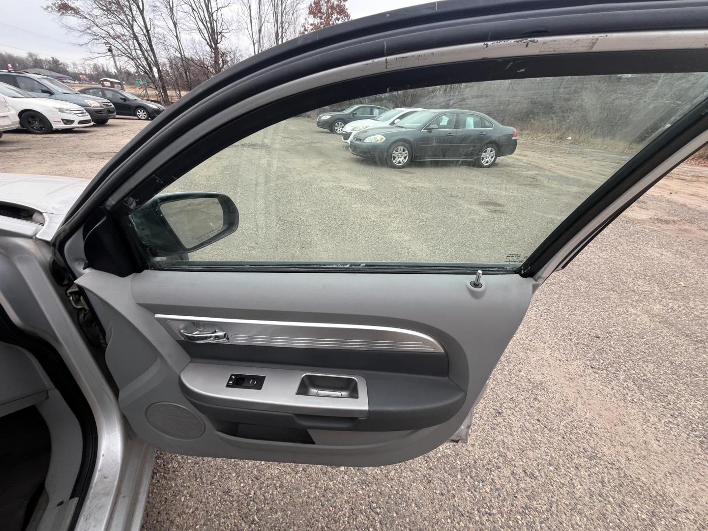 2007 silver Chrysler Sebring Touring (1C3LC56R57N) with an 2.7L V6 DOHC 24V FFV engine, 4-Speed Automatic Overdrive transmission, located at 17255 hwy 65 NE, Ham Lake, MN, 55304, 0.000000, 0.000000 - Photo#12