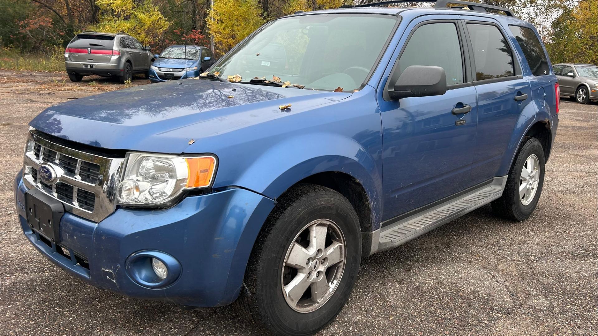 2010 Blue Ford Escape XLT 4WD (1FMCU9DG2AK) with an 3.0L V6 DOHC 24V engine, 6-Speed Automatic transmission, located at 17255 hwy 65 NE, Ham Lake, MN, 55304, 0.000000, 0.000000 - Photo#0