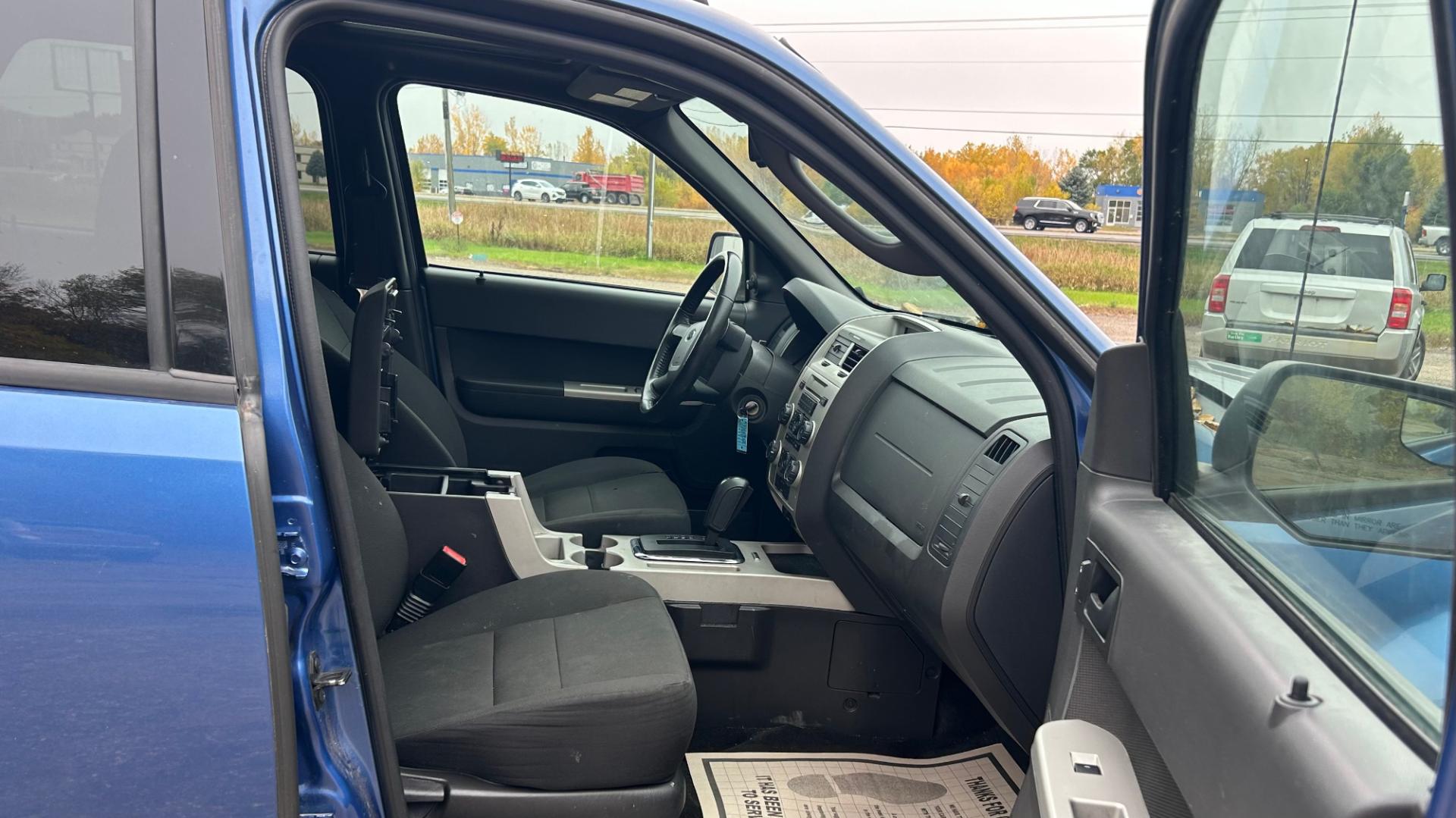 2010 Blue Ford Escape XLT 4WD (1FMCU9DG2AK) with an 3.0L V6 DOHC 24V engine, 6-Speed Automatic transmission, located at 17255 hwy 65 NE, Ham Lake, MN, 55304, 0.000000, 0.000000 - Photo#15