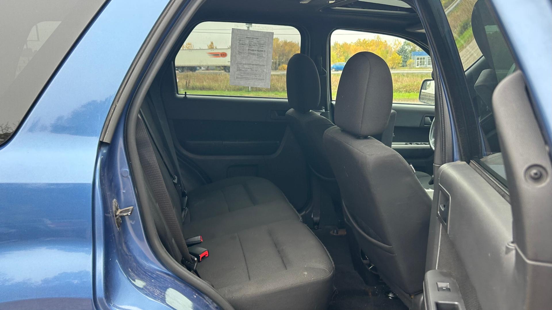 2010 Blue Ford Escape XLT 4WD (1FMCU9DG2AK) with an 3.0L V6 DOHC 24V engine, 6-Speed Automatic transmission, located at 17255 hwy 65 NE, Ham Lake, MN, 55304, 0.000000, 0.000000 - Photo#13