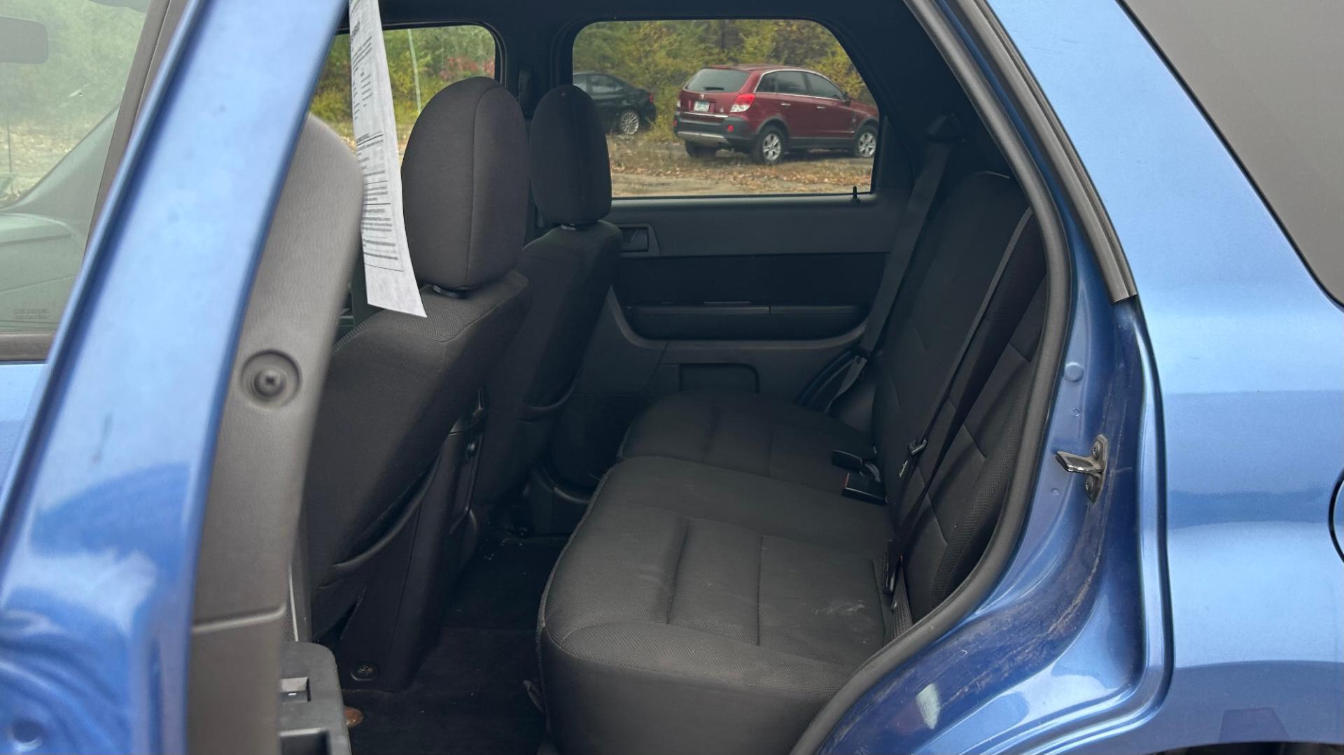 2010 Blue Ford Escape XLT 4WD (1FMCU9DG2AK) with an 3.0L V6 DOHC 24V engine, 6-Speed Automatic transmission, located at 17255 hwy 65 NE, Ham Lake, MN, 55304, 0.000000, 0.000000 - Photo#11