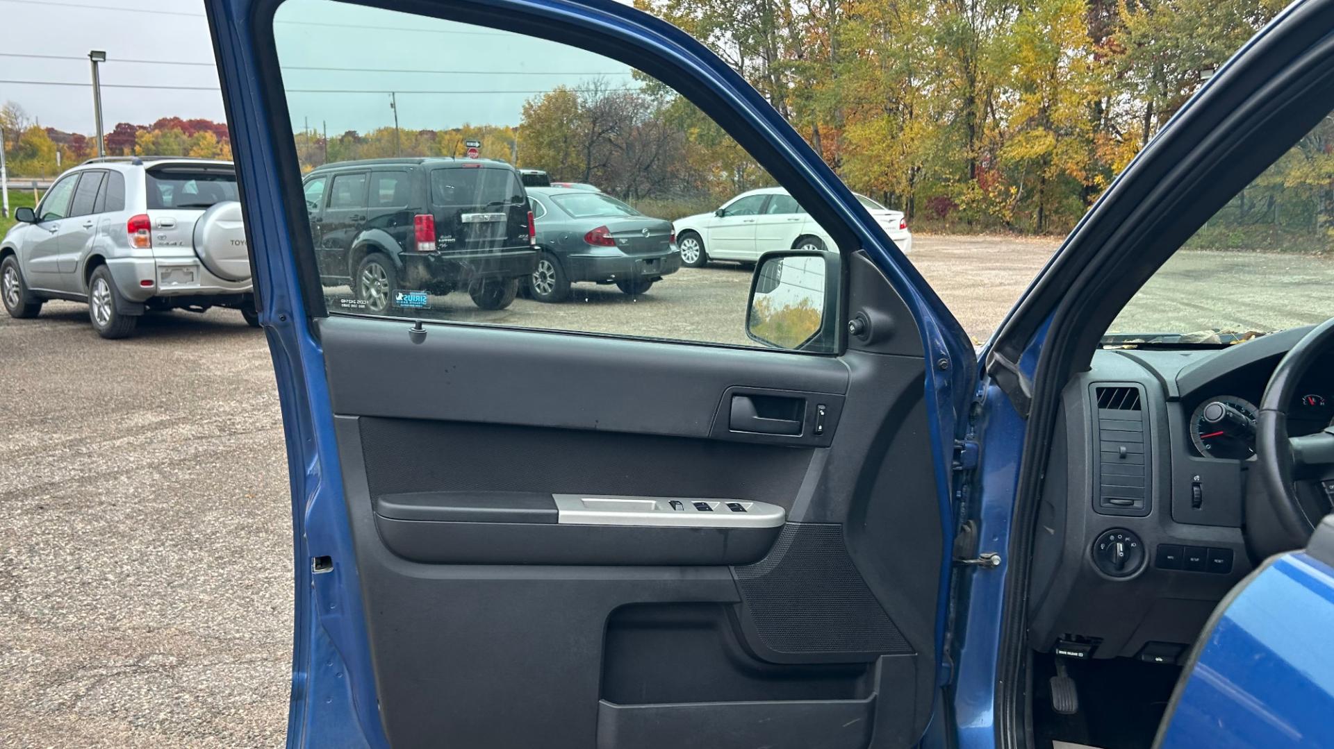 2010 Blue Ford Escape XLT 4WD (1FMCU9DG2AK) with an 3.0L V6 DOHC 24V engine, 6-Speed Automatic transmission, located at 17255 hwy 65 NE, Ham Lake, MN, 55304, 0.000000, 0.000000 - Photo#8