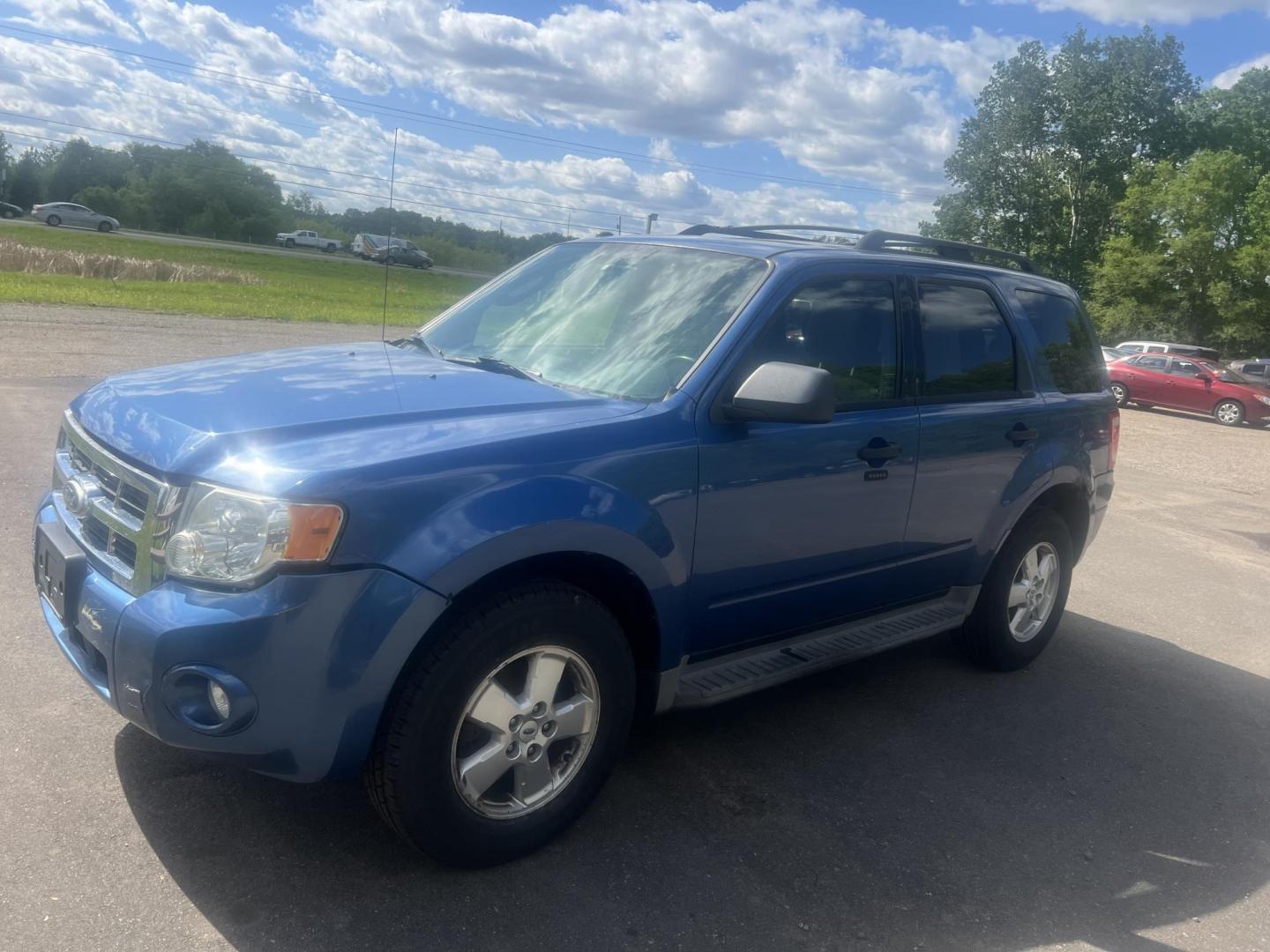 2010 Blue Ford Escape XLT 4WD (1FMCU9DG2AK) with an 3.0L V6 DOHC 24V engine, 6-Speed Automatic transmission, located at 17255 hwy 65 NE, Ham Lake, MN, 55304, 0.000000, 0.000000 - Photo#0