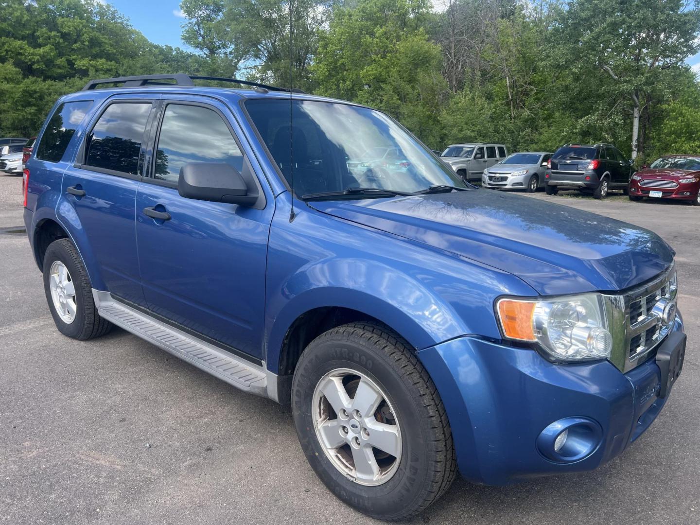 2010 Blue Ford Escape XLT 4WD (1FMCU9DG2AK) with an 3.0L V6 DOHC 24V engine, 6-Speed Automatic transmission, located at 17255 hwy 65 NE, Ham Lake, MN, 55304, 0.000000, 0.000000 - Photo#6