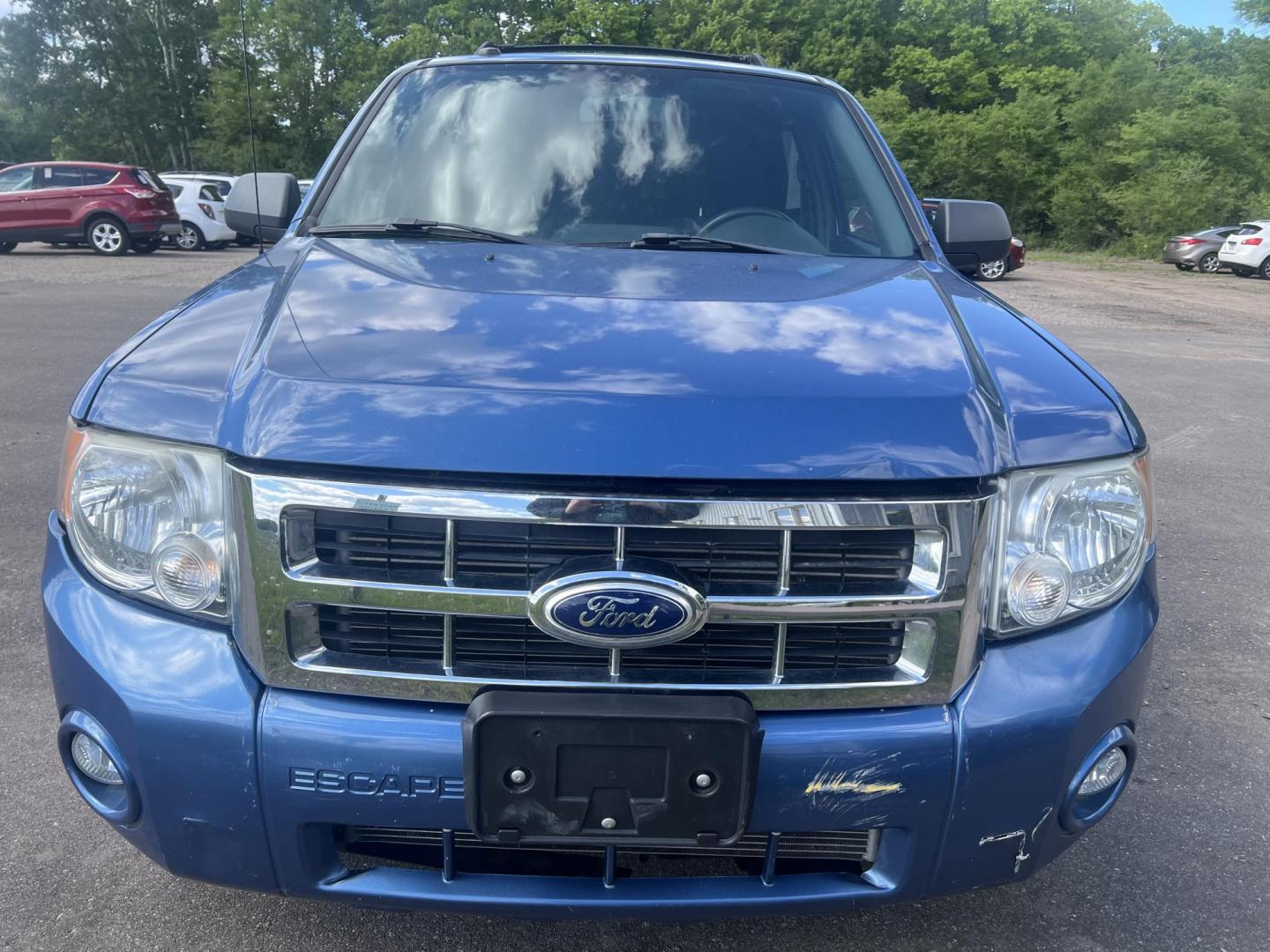 2010 Blue Ford Escape XLT 4WD (1FMCU9DG2AK) with an 3.0L V6 DOHC 24V engine, 6-Speed Automatic transmission, located at 17255 hwy 65 NE, Ham Lake, MN, 55304, 0.000000, 0.000000 - Photo#7