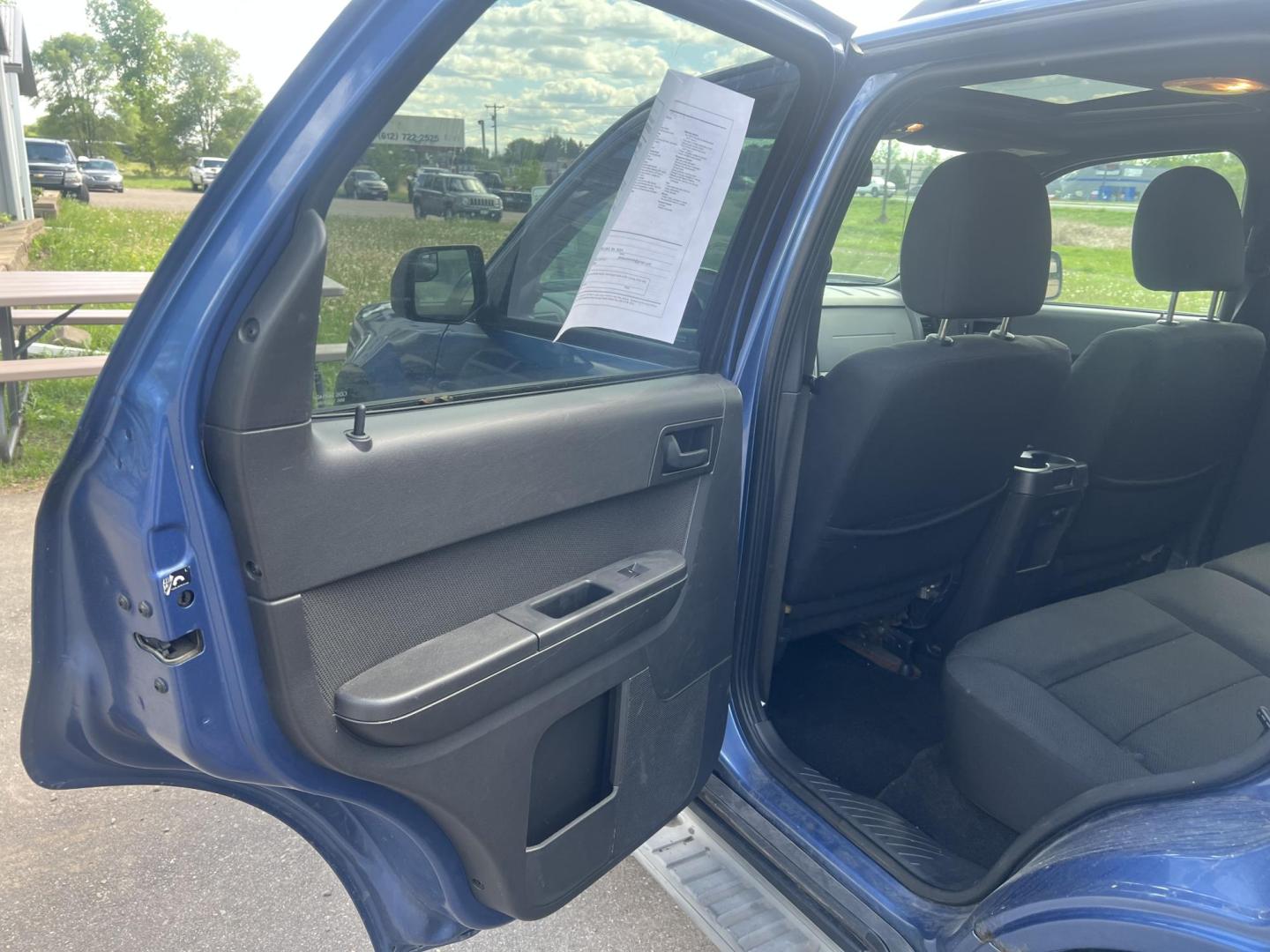 2010 Blue Ford Escape XLT 4WD (1FMCU9DG2AK) with an 3.0L V6 DOHC 24V engine, 6-Speed Automatic transmission, located at 17255 hwy 65 NE, Ham Lake, MN, 55304, 0.000000, 0.000000 - Photo#10