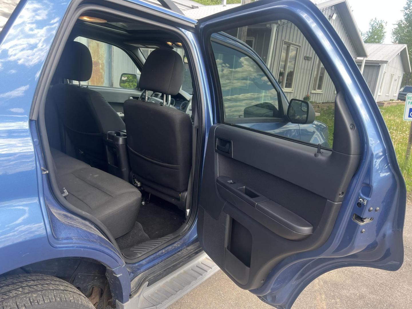 2010 Blue Ford Escape XLT 4WD (1FMCU9DG2AK) with an 3.0L V6 DOHC 24V engine, 6-Speed Automatic transmission, located at 17255 hwy 65 NE, Ham Lake, MN, 55304, 0.000000, 0.000000 - Photo#12