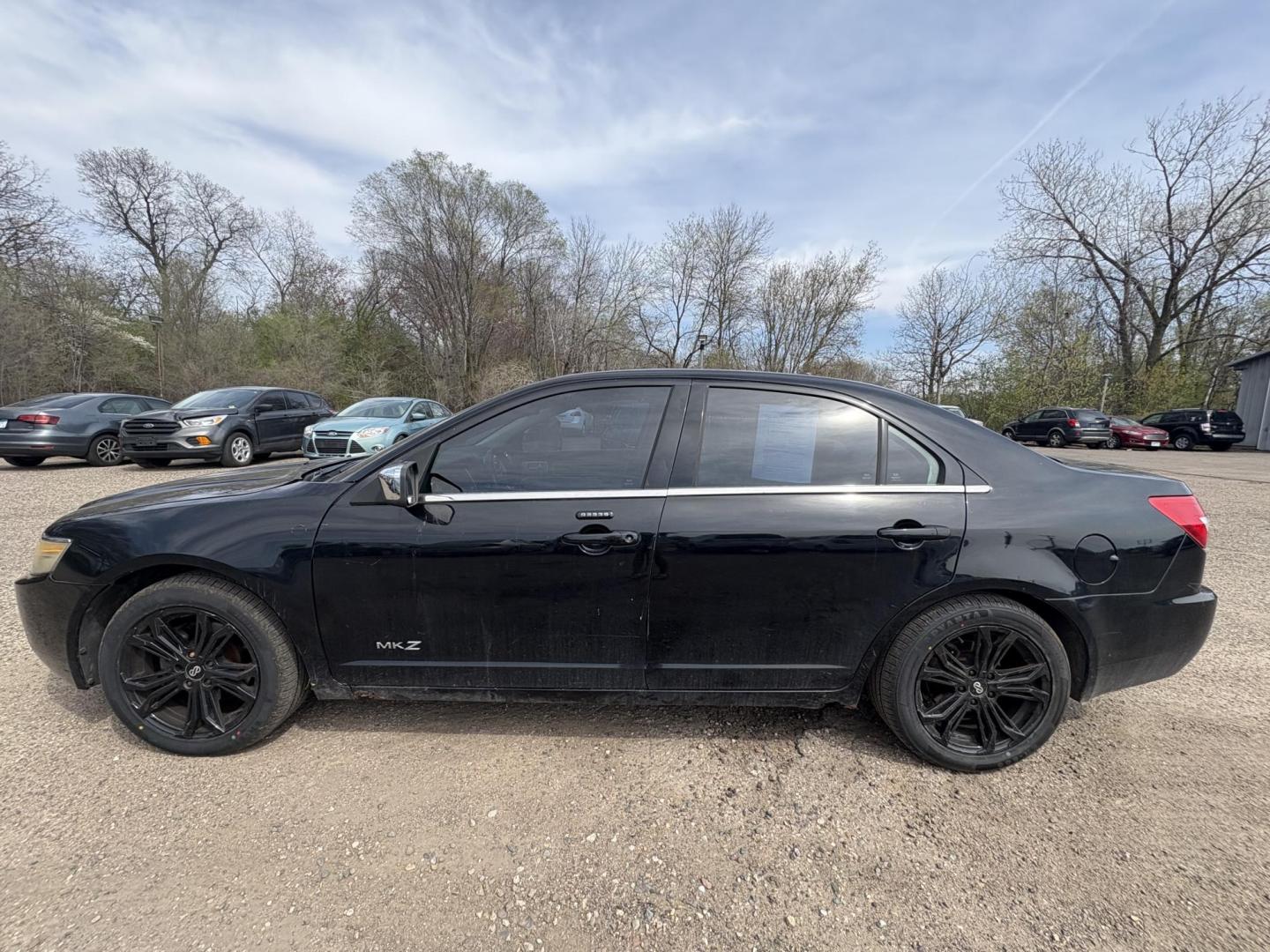 2007 Black Lincoln MKZ AWD (3LNHM28T47R) with an 3.5L V6 DOHC 24V engine, 6-Speed Automatic Overdrive transmission, located at 17255 hwy 65 NE, Ham Lake, MN, 55304, 0.000000, 0.000000 - Photo#1