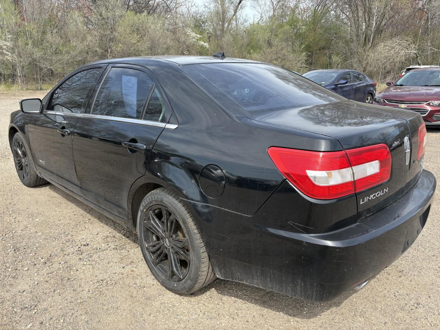 2007 Black Lincoln MKZ AWD (3LNHM28T47R) with an 3.5L V6 DOHC 24V engine, 6-Speed Automatic Overdrive transmission, located at 17255 hwy 65 NE, Ham Lake, MN, 55304, 0.000000, 0.000000 - Photo#2