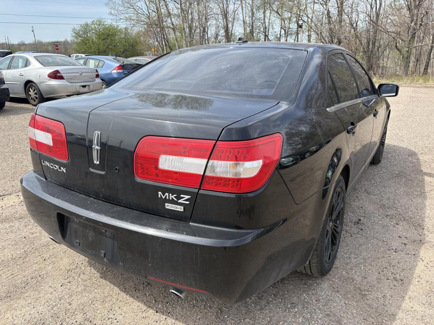 2007 Black Lincoln MKZ AWD (3LNHM28T47R) with an 3.5L V6 DOHC 24V engine, 6-Speed Automatic Overdrive transmission, located at 17255 hwy 65 NE, Ham Lake, MN, 55304, 0.000000, 0.000000 - Photo#4