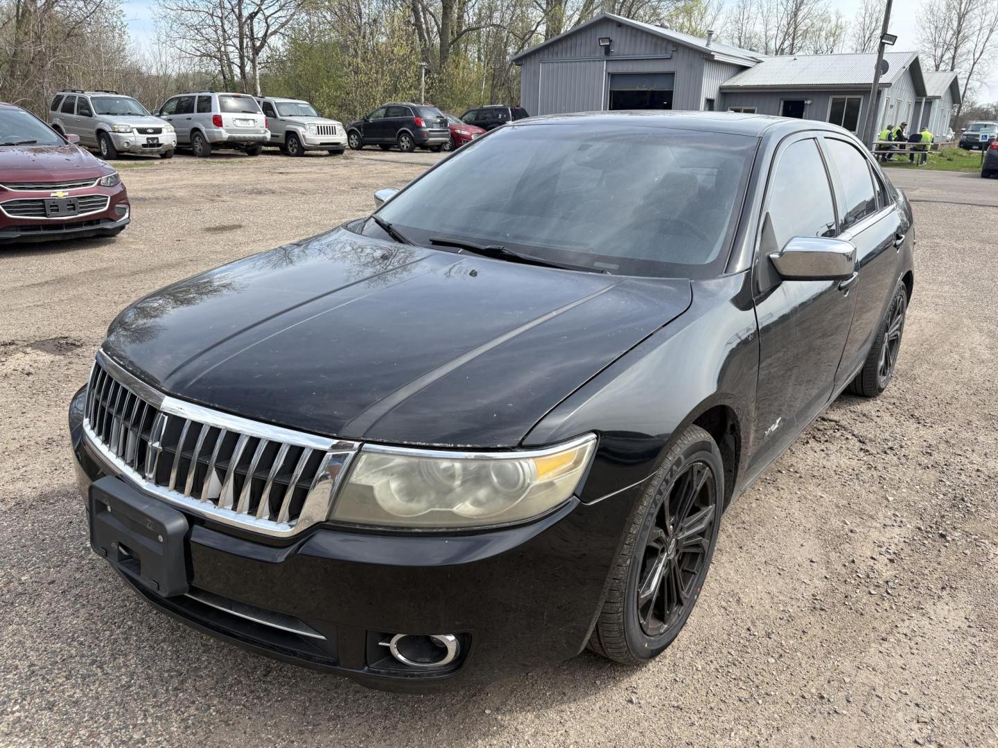 2007 Black Lincoln MKZ AWD (3LNHM28T47R) with an 3.5L V6 DOHC 24V engine, 6-Speed Automatic Overdrive transmission, located at 17255 hwy 65 NE, Ham Lake, MN, 55304, 0.000000, 0.000000 - Photo#0