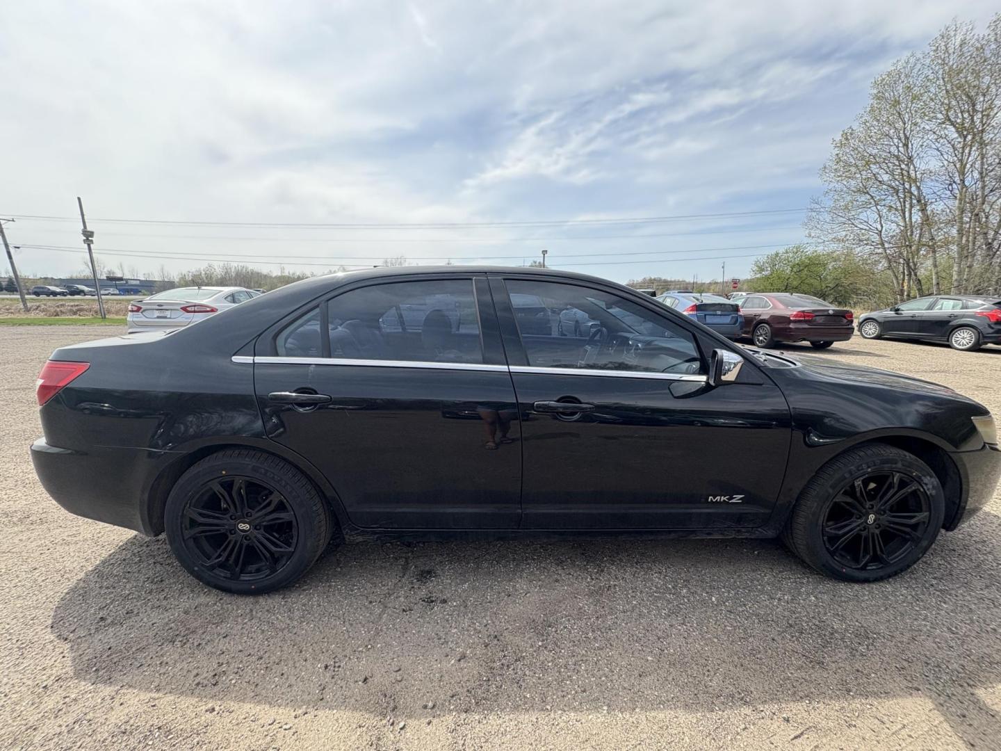 2007 Black Lincoln MKZ AWD (3LNHM28T47R) with an 3.5L V6 DOHC 24V engine, 6-Speed Automatic Overdrive transmission, located at 17255 hwy 65 NE, Ham Lake, MN, 55304, 0.000000, 0.000000 - Photo#5