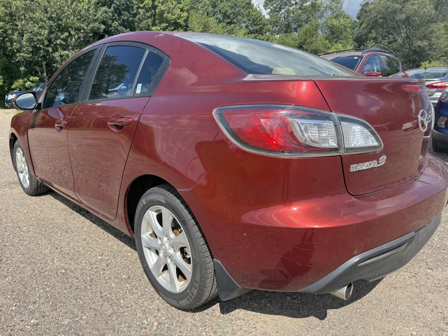 2010 red Mazda MAZDA3 Unknown (JM1BL1SF1A1) , located at 17255 hwy 65 NE, Ham Lake, MN, 55304, 0.000000, 0.000000 - Photo#2