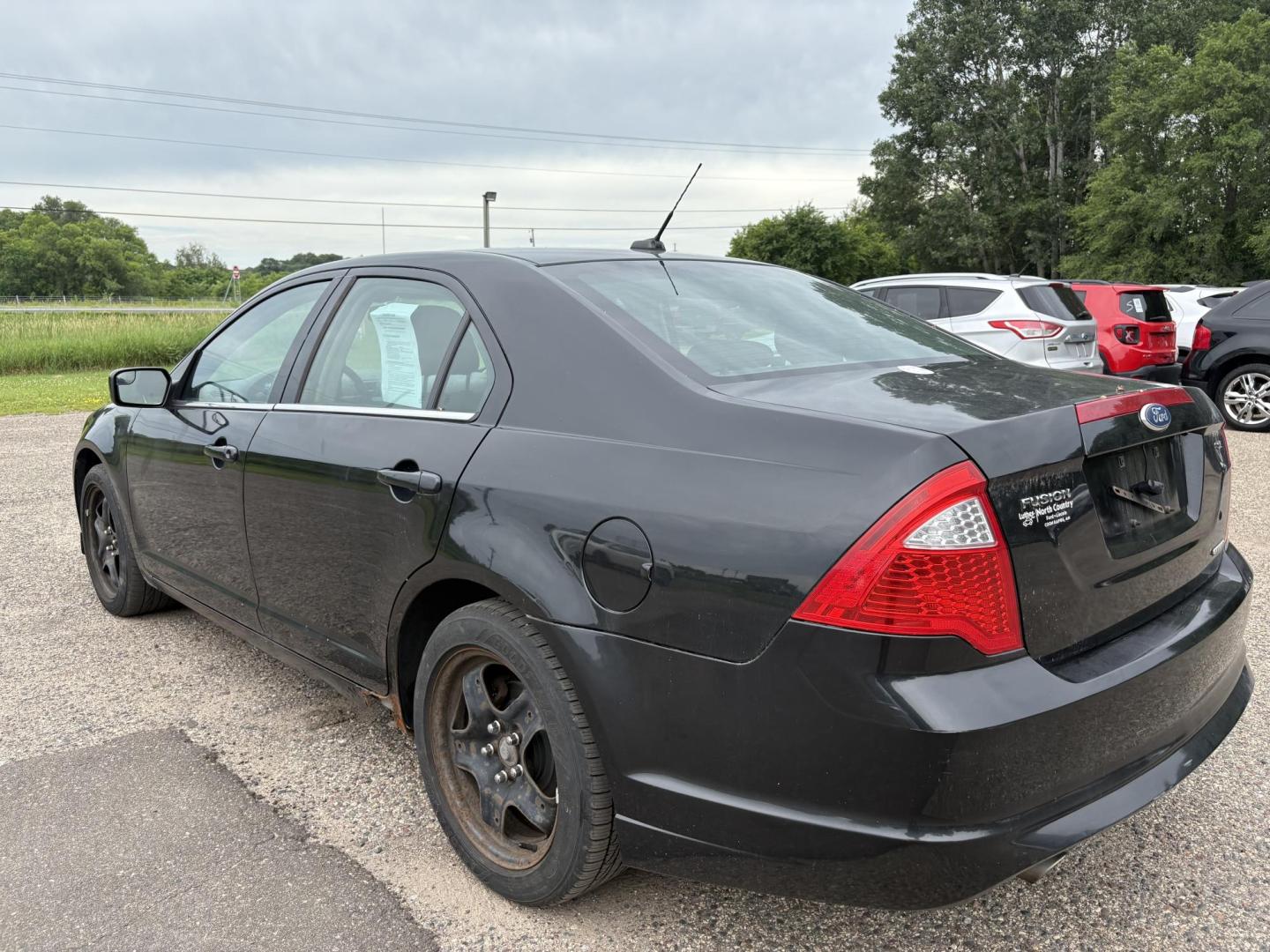 2011 Black Ford Fusion V6 SE (3FAHP0HG3BR) with an 3.0L V6 DOHC 24V engine, located at 17255 hwy 65 NE, Ham Lake, MN, 55304, 0.000000, 0.000000 - Photo#2