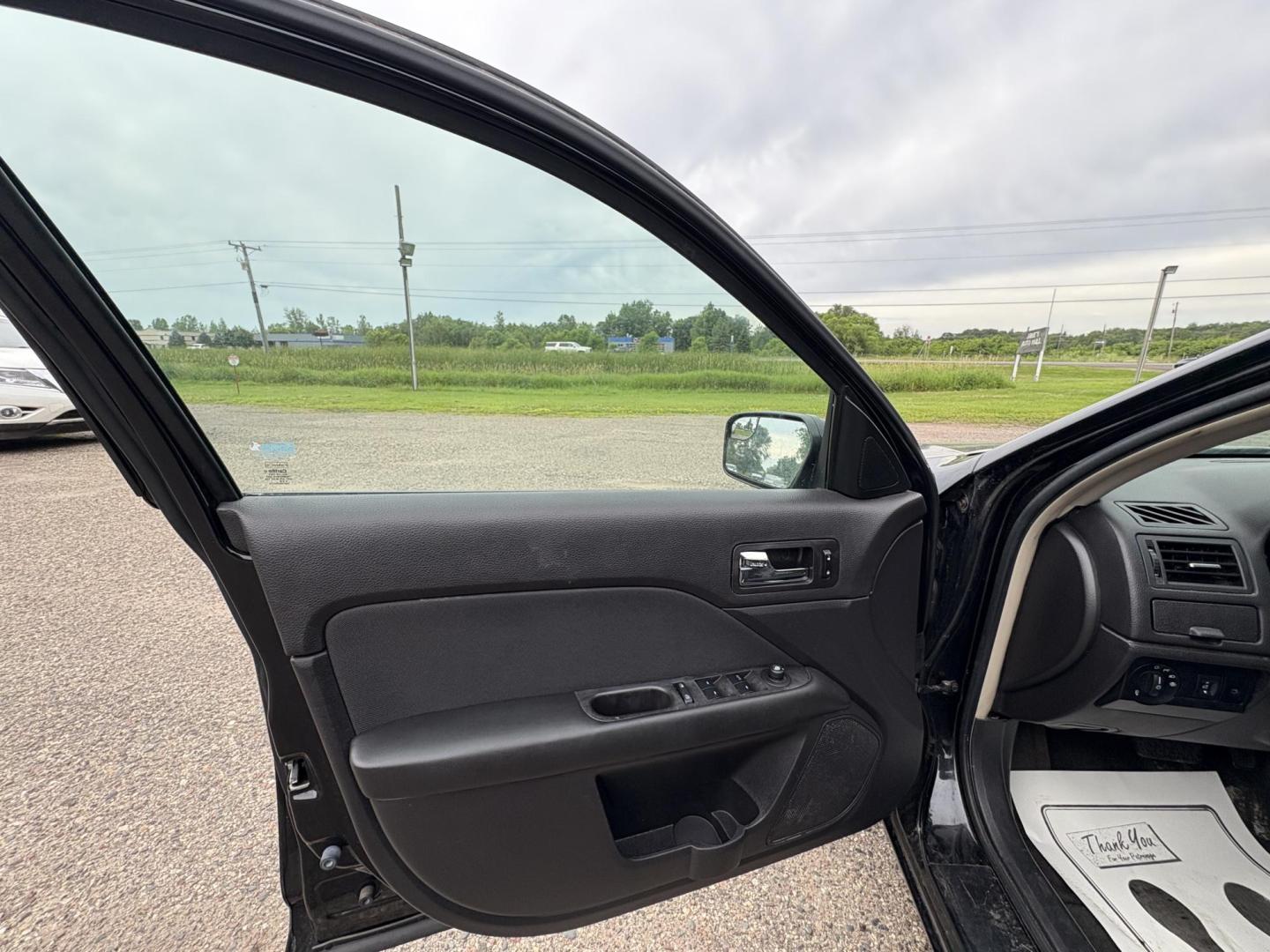 2011 Black Ford Fusion V6 SE (3FAHP0HG3BR) with an 3.0L V6 DOHC 24V engine, located at 17255 hwy 65 NE, Ham Lake, MN, 55304, 0.000000, 0.000000 - Photo#8