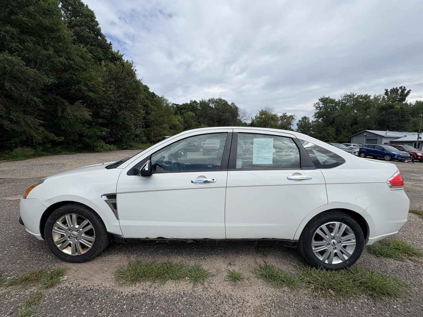 2009 Ford Focus SEL Sedan (1FAHP37N99W) with an 2.0L L4 DOHC 16V engine, located at 17255 hwy 65 NE, Ham Lake, MN, 55304, 0.000000, 0.000000 - Photo#1