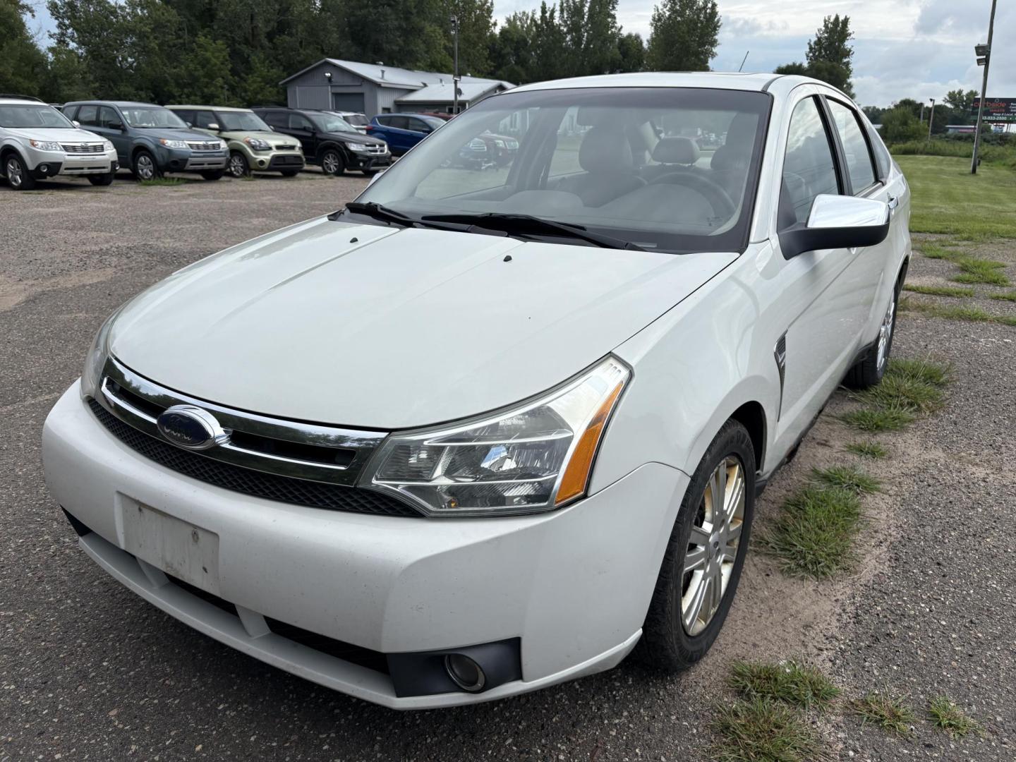 2009 Ford Focus SEL Sedan (1FAHP37N99W) with an 2.0L L4 DOHC 16V engine, located at 17255 hwy 65 NE, Ham Lake, MN, 55304, 0.000000, 0.000000 - Photo#0