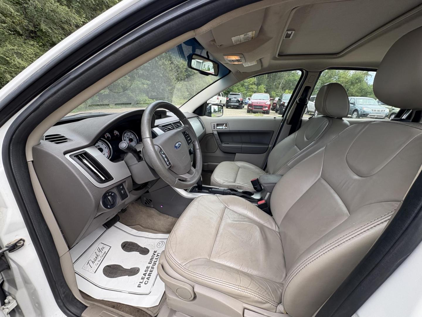 2009 Ford Focus SEL Sedan (1FAHP37N99W) with an 2.0L L4 DOHC 16V engine, located at 17255 hwy 65 NE, Ham Lake, MN, 55304, 0.000000, 0.000000 - Photo#9