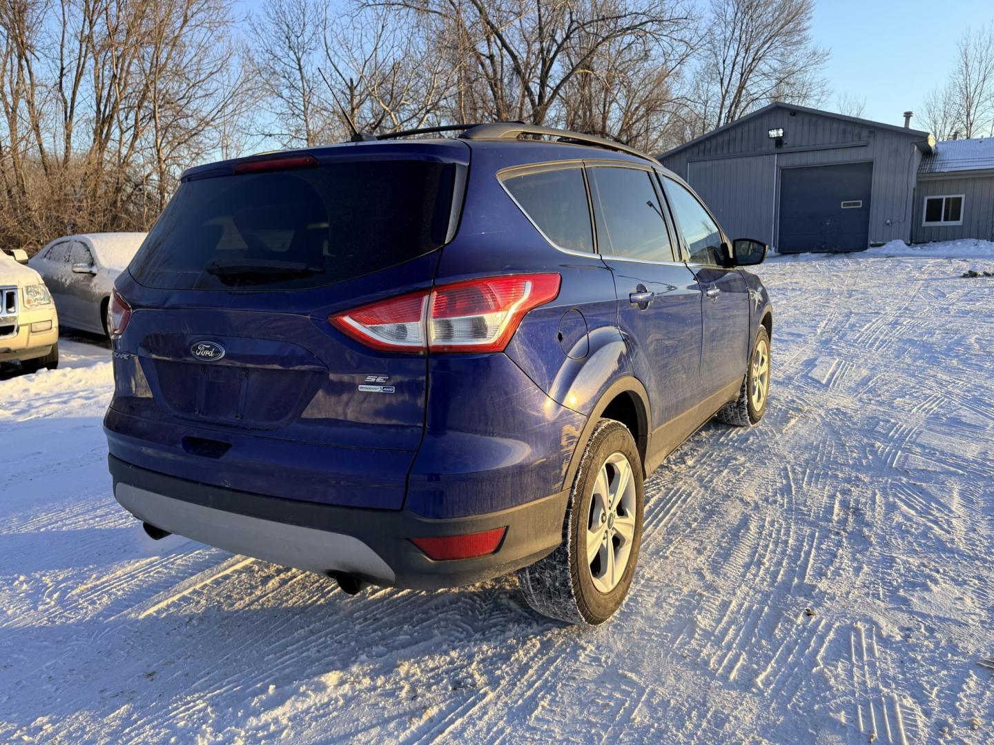 2013 Ford Escape SE 4WD (1FMCU9G92DU) with an 2.0L L4 DOHC 16V engine, 6-Speed Automatic transmission, located at 17255 hwy 65 NE, Ham Lake, MN, 55304, 0.000000, 0.000000 - Photo#4