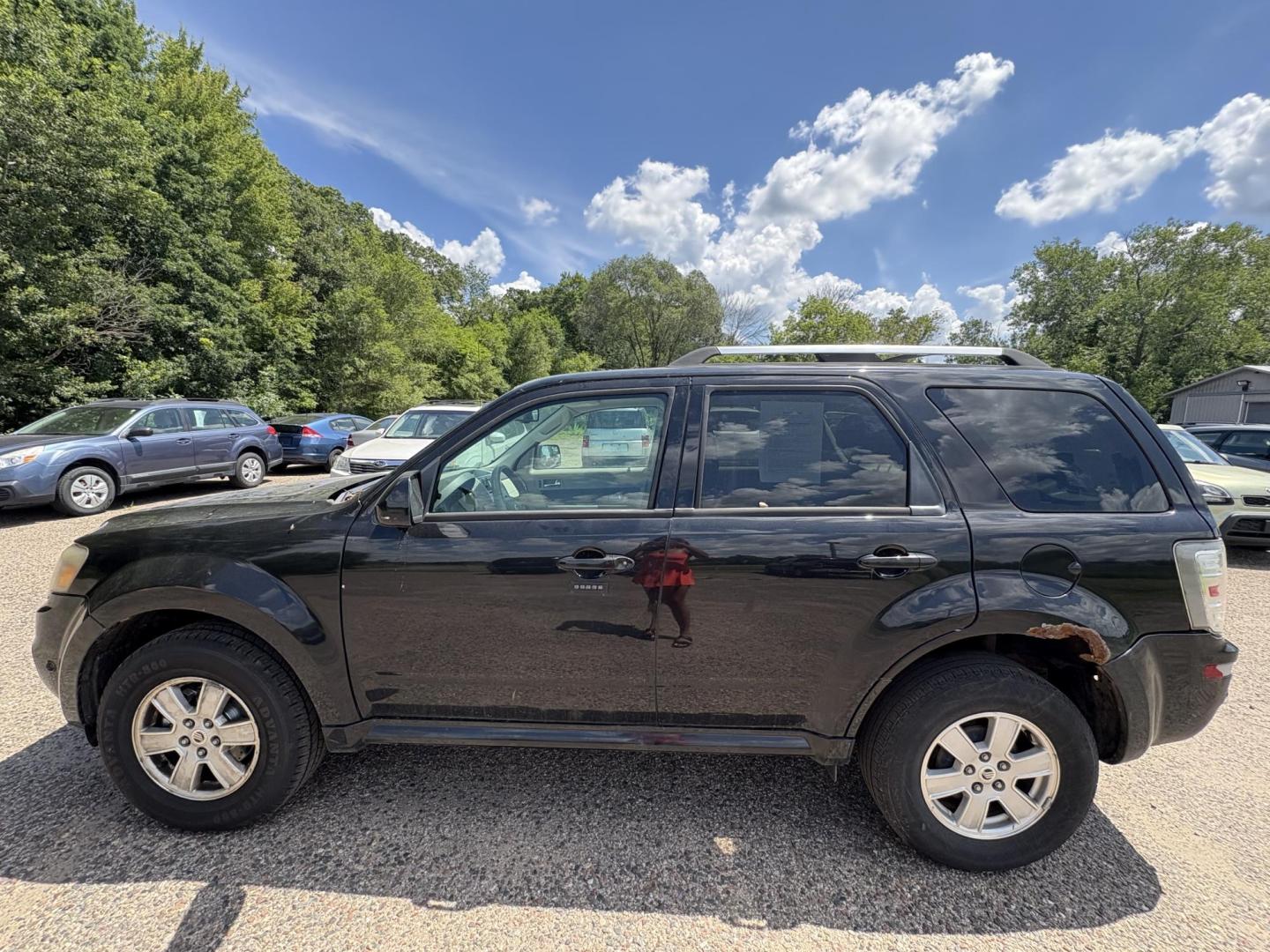 2011 Mercury Mariner Premier V6 2WD (4M2CN8HG6BK) , 6-Speed Automatic transmission, located at 17255 hwy 65 NE, Ham Lake, MN, 55304, 0.000000, 0.000000 - Photo#1